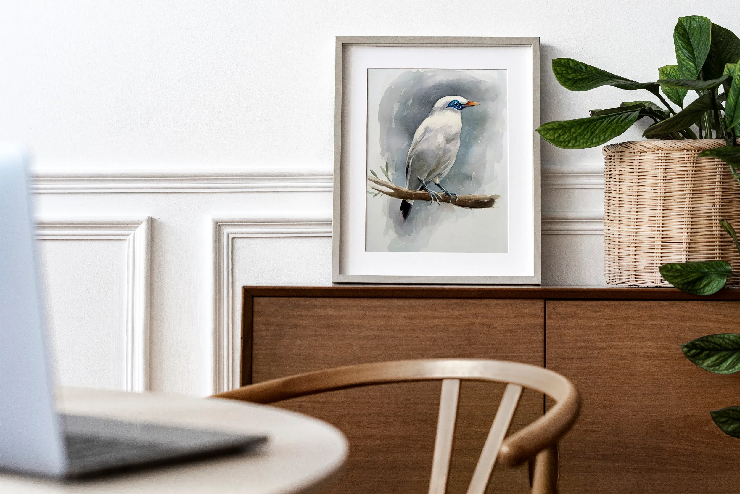 Original watercolour prints on a desk